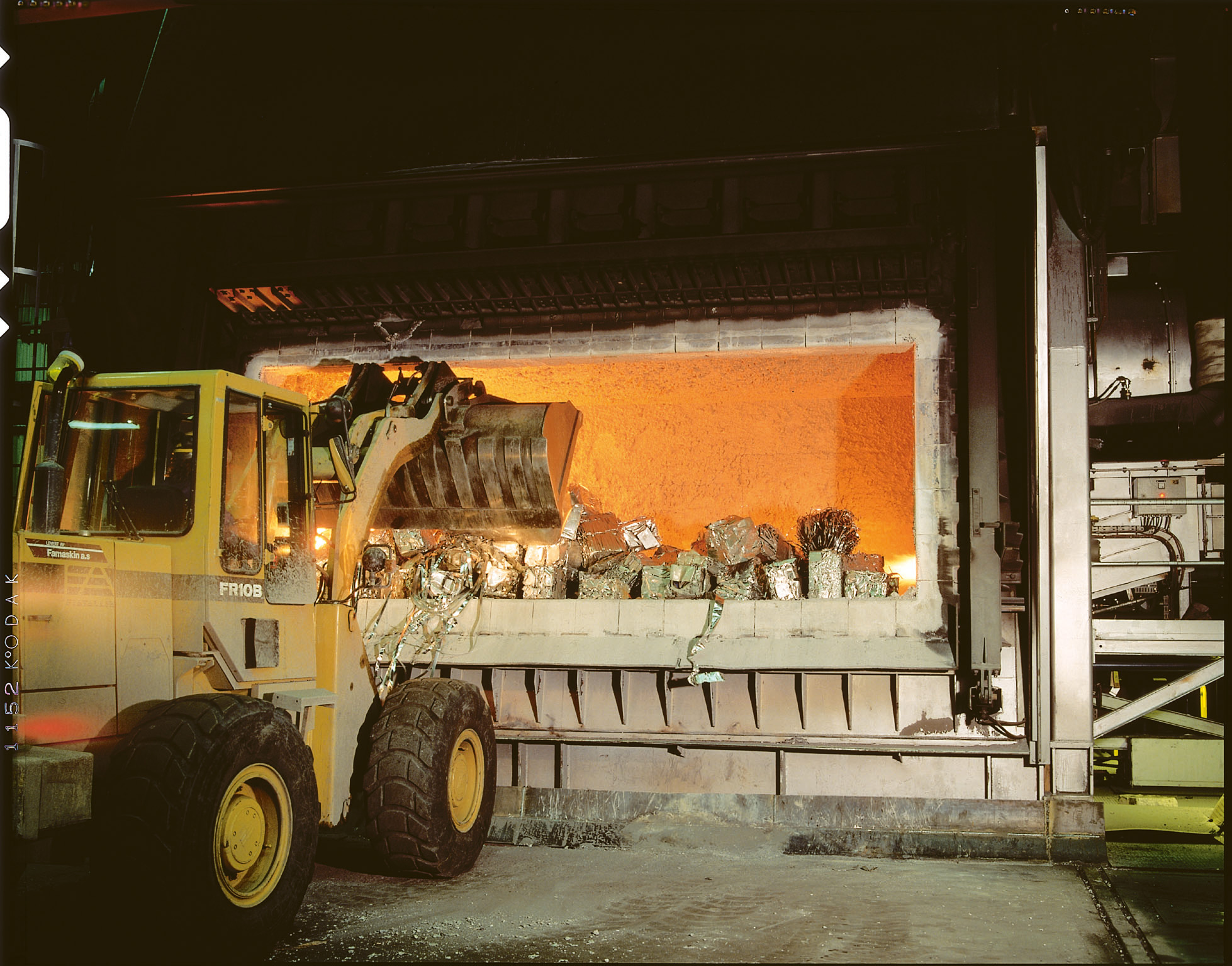 Aluminum scrap being melted in furnace