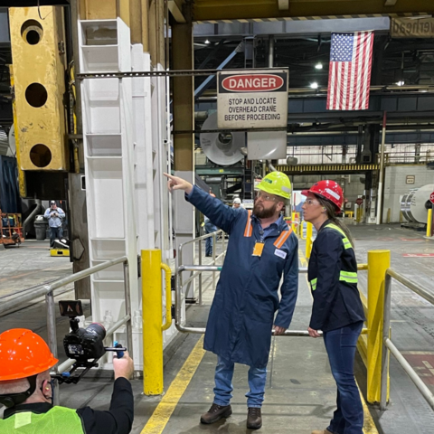 Image of plant workers on a manufacturing floor